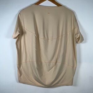 Lululemon Back in Action Short Sleeve Tee Size 4 It has a stain on the front